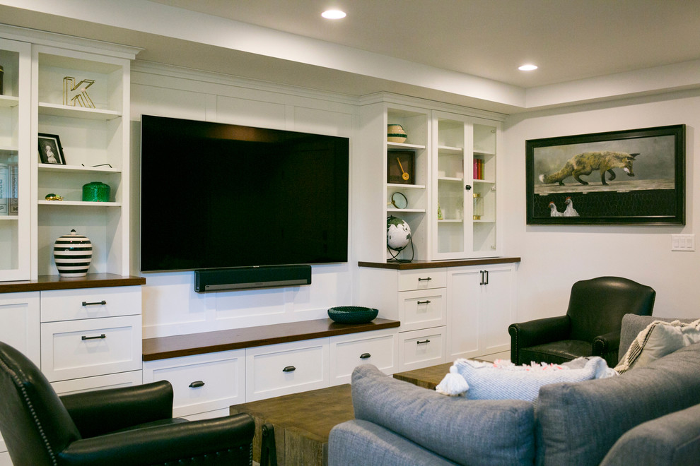 Mid-sized transitional open concept home theatre in Miami with a wall-mounted tv and white walls.