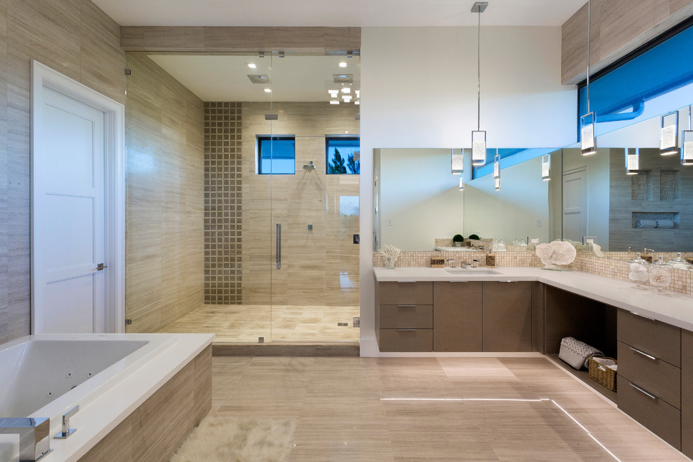 Photo of a contemporary master bathroom in Other with flat-panel cabinets, brown cabinets, a drop-in tub, an alcove shower, beige tile, brown tile, white walls, an undermount sink, beige floor, a hinged shower door and grey benchtops.