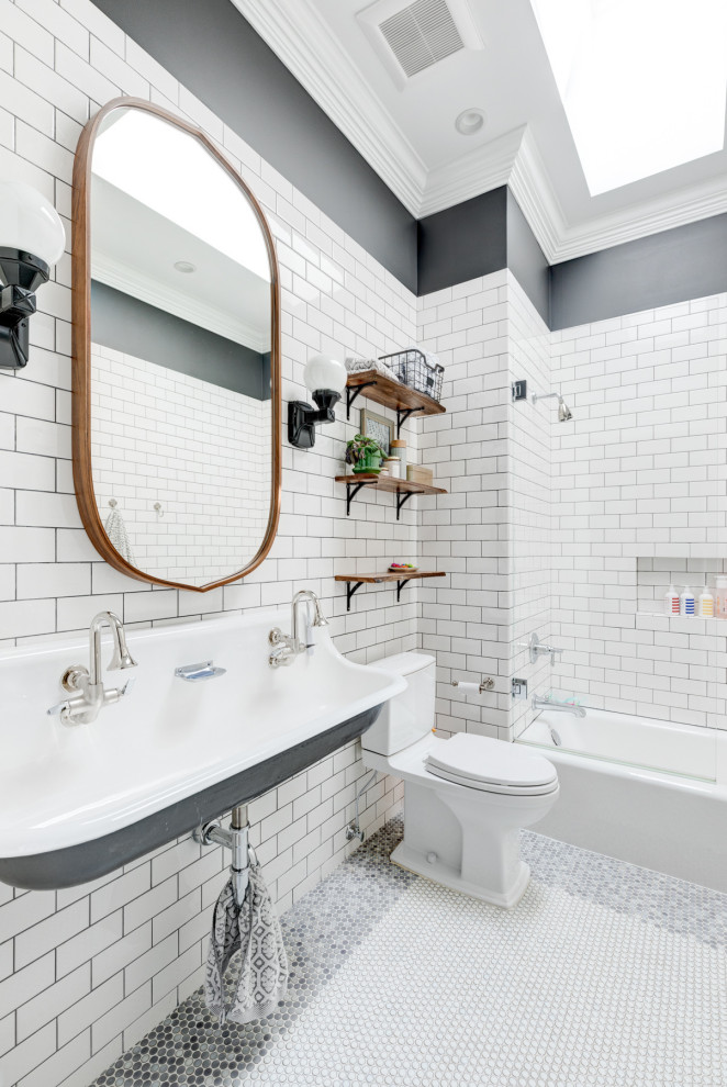Photo of a transitional bathroom in Chicago with an alcove tub, a shower/bathtub combo, white tile, subway tile, grey walls, mosaic tile floors, a wall-mount sink and multi-coloured floor.