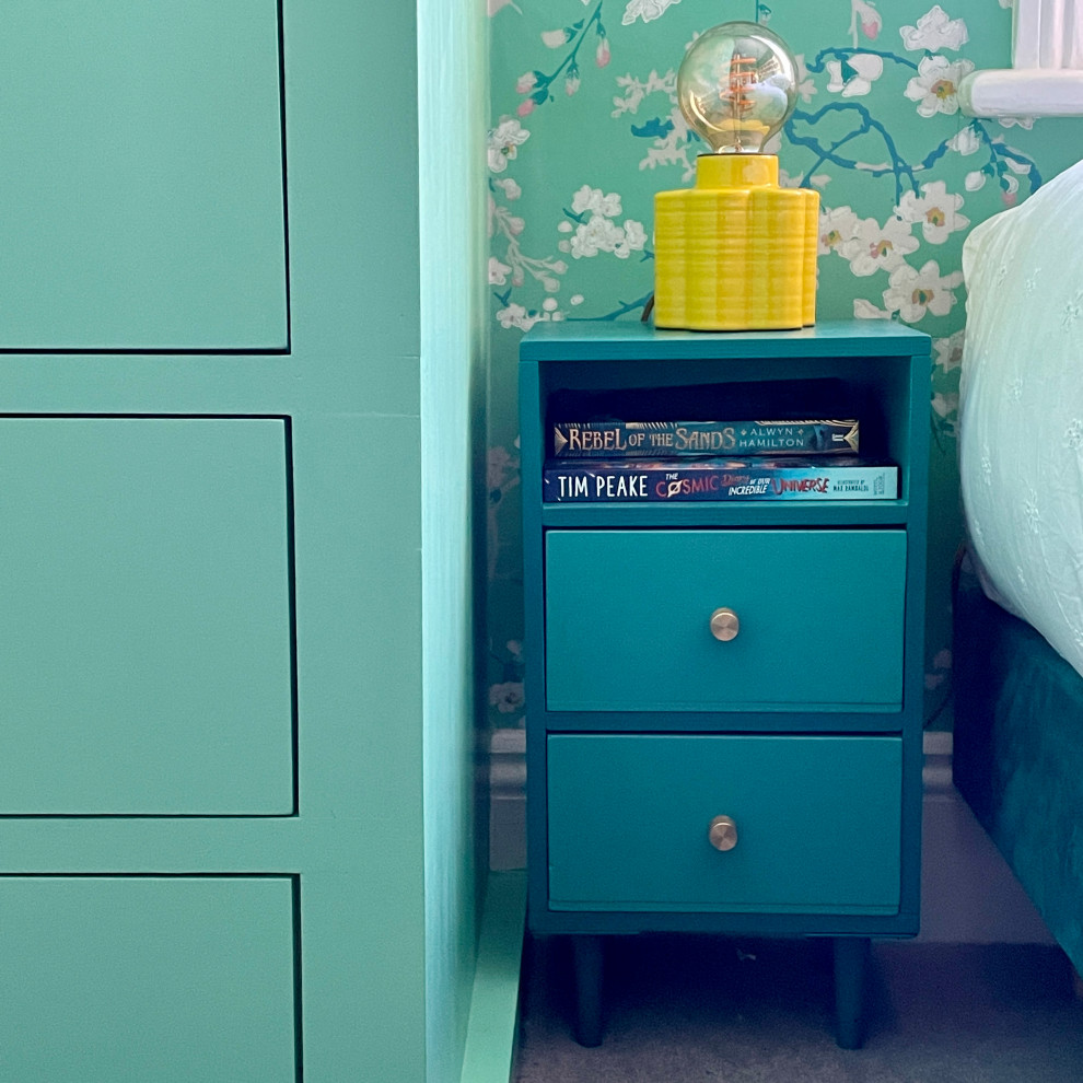 Design ideas for a small modern kids' bedroom for kids 4-10 years old and girls in London with green walls, carpet, grey floor and wallpaper.
