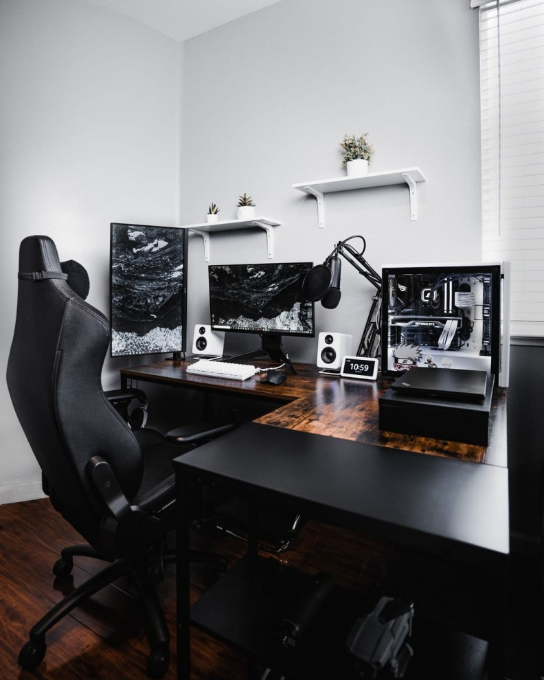 Inspiration for a mid-sized modern freestanding desk study room remodel in San Francisco