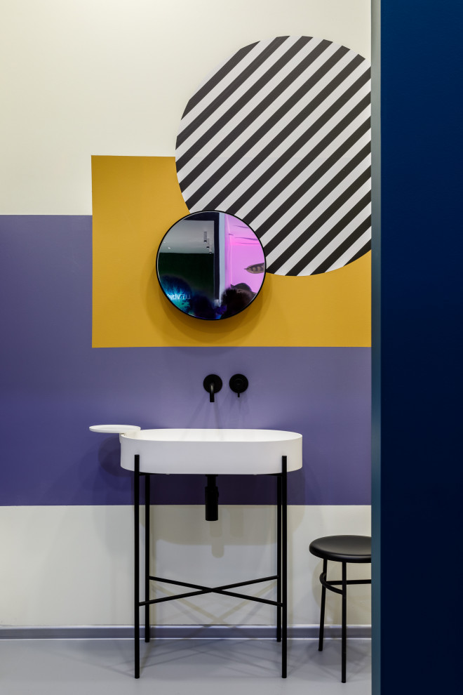 Inspiration for a contemporary powder room in Moscow with multi-coloured walls, a console sink, grey floor and wallpaper.