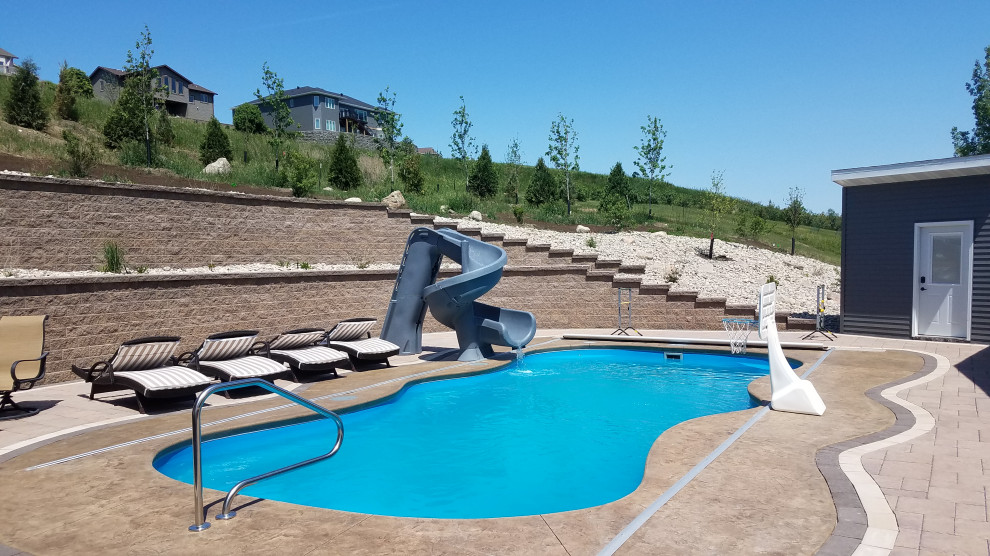 Water slide - large 1960s backyard concrete paver water slide idea