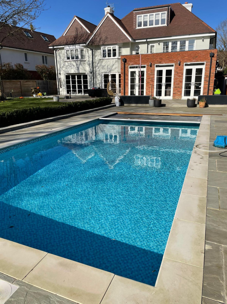 Double storey side and single rear extensions, full roof reconfiguration