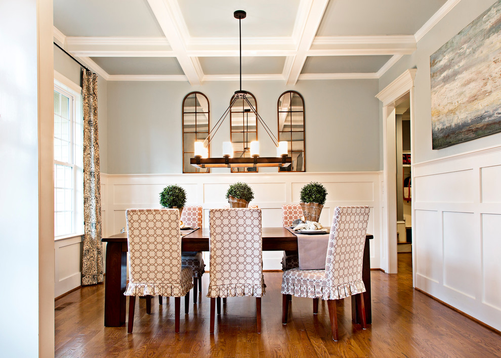 This is an example of a transitional dining room in Raleigh.