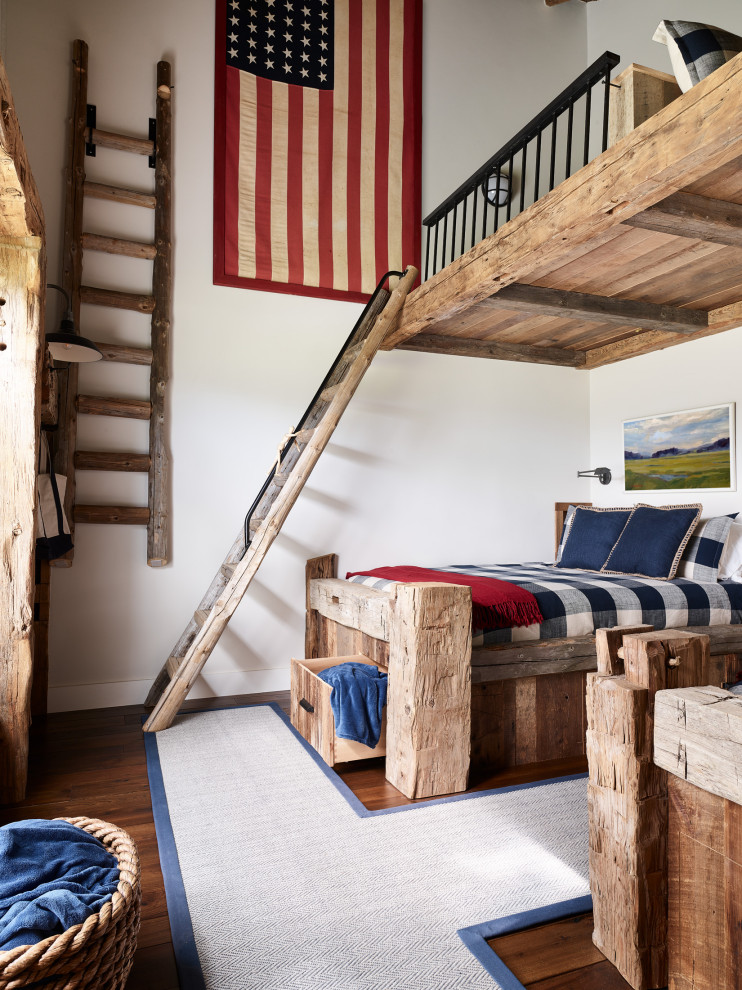 Large mountain style dark wood floor and brown floor kids' room photo in Boston with white walls