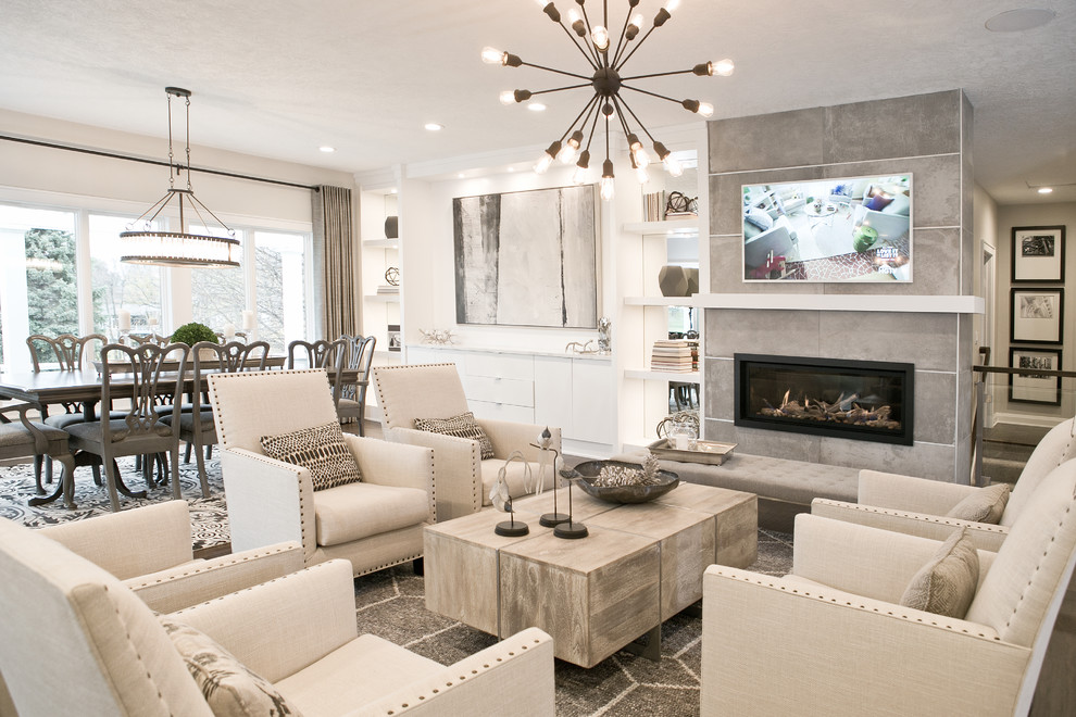 Large transitional open concept living room in Chicago with grey walls, dark hardwood floors, a ribbon fireplace, a tile fireplace surround, a wall-mounted tv and brown floor.