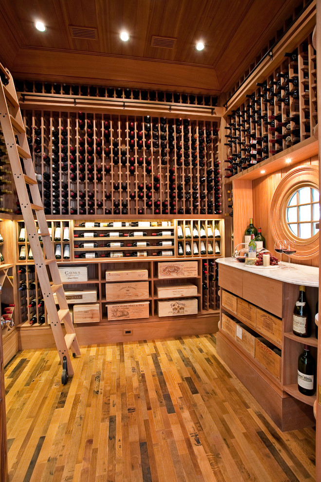 Inspiration for a traditional wine cellar in San Francisco with storage racks and yellow floor.