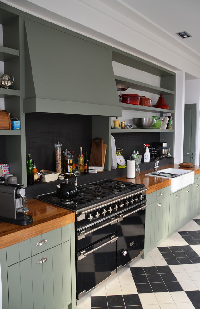 Photo of a large contemporary single-wall separate kitchen in Le Havre with green cabinets and no island.