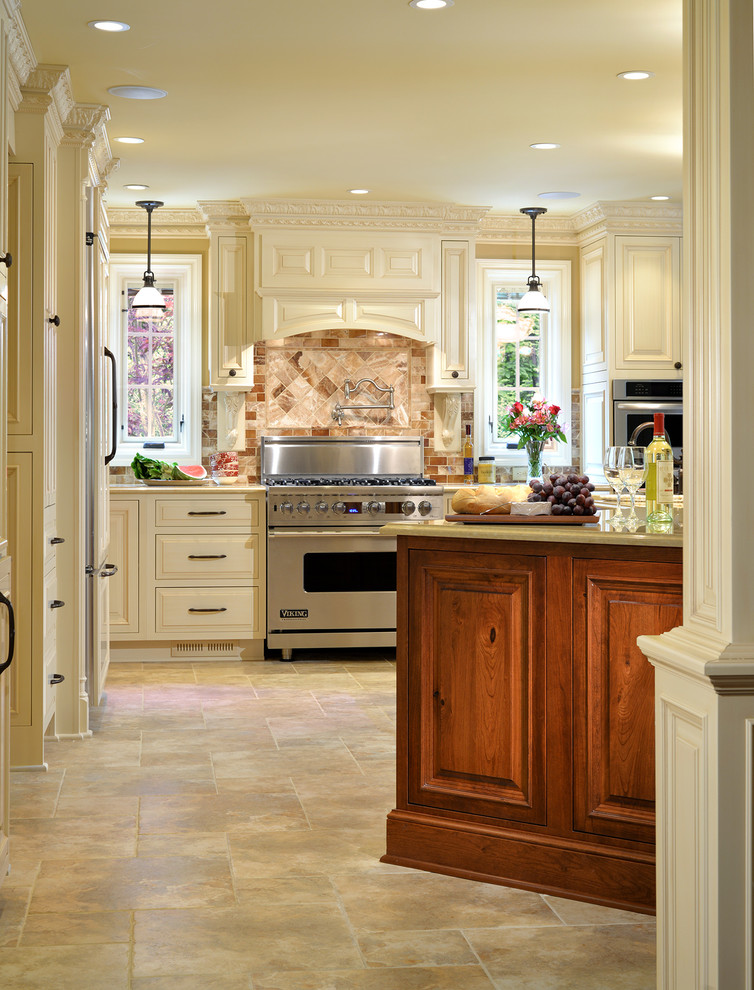 Design ideas for a large traditional l-shaped eat-in kitchen in Atlanta with white cabinets, granite benchtops, brown splashback, stone tile splashback, stainless steel appliances, ceramic floors and with island.