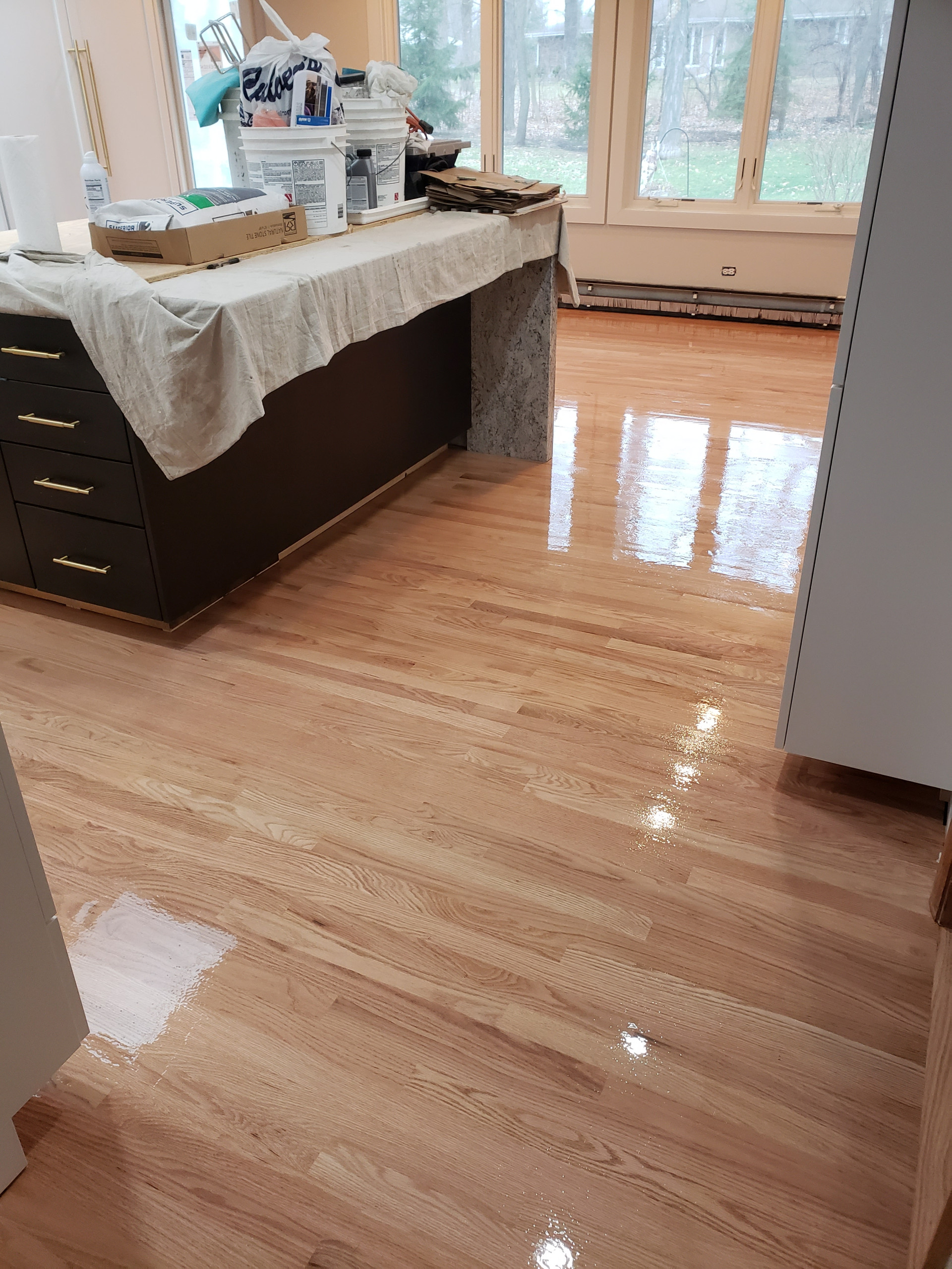 Hawthorn Woods,  2 and 1/4 red oak , 3 coats Bona Traffic Hd