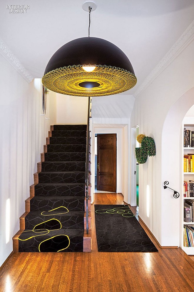 Design ideas for a mid-sized contemporary carpeted u-shaped staircase in Melbourne with carpet risers.