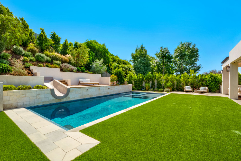 Inspiration for a transitional pool remodel in Orange County