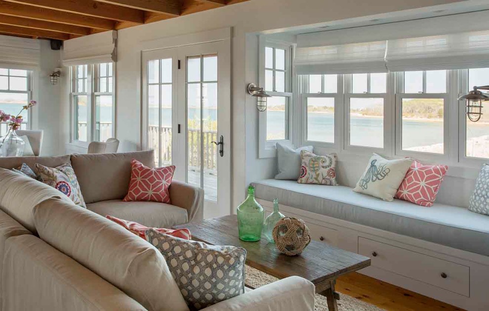 Design ideas for a beach style open concept family room in Boston with white walls.