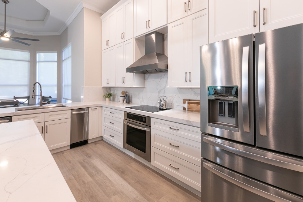 Example of a transitional kitchen design in Miami