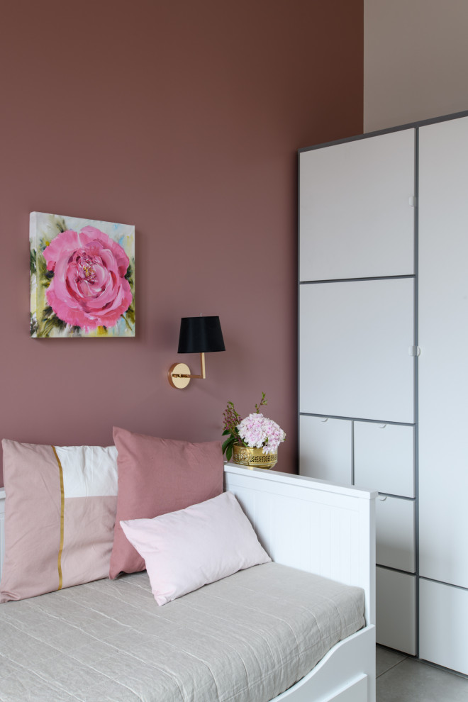 This is an example of a small transitional kids' bedroom for girls and kids 4-10 years old in Moscow with pink walls, ceramic floors and grey floor.
