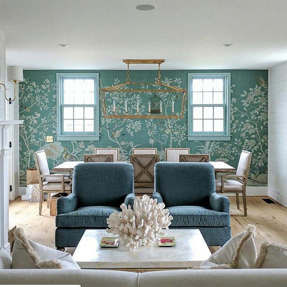 Inspiration for a mid-sized transitional light wood floor and beige floor great room remodel with multicolored walls