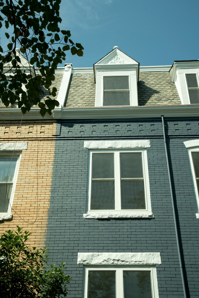 Design ideas for a small modern three-storey brick black townhouse exterior in DC Metro.