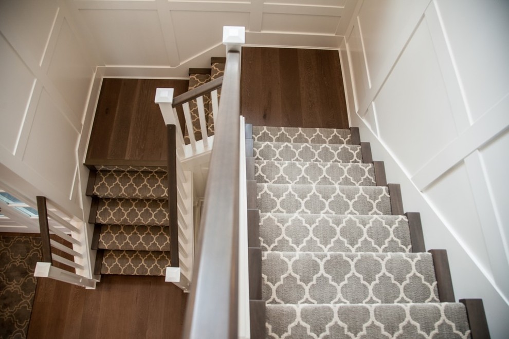 Design ideas for a large transitional wood staircase in Vancouver with wood risers.