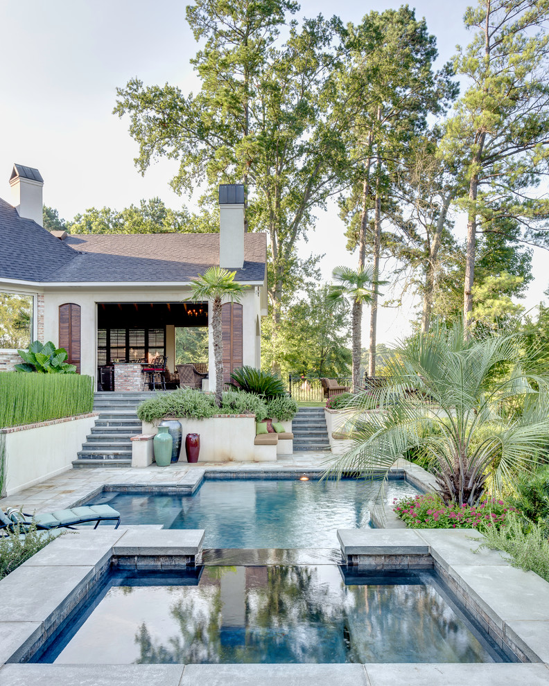 Photo of a mediterranean custom-shaped pool in New Orleans.