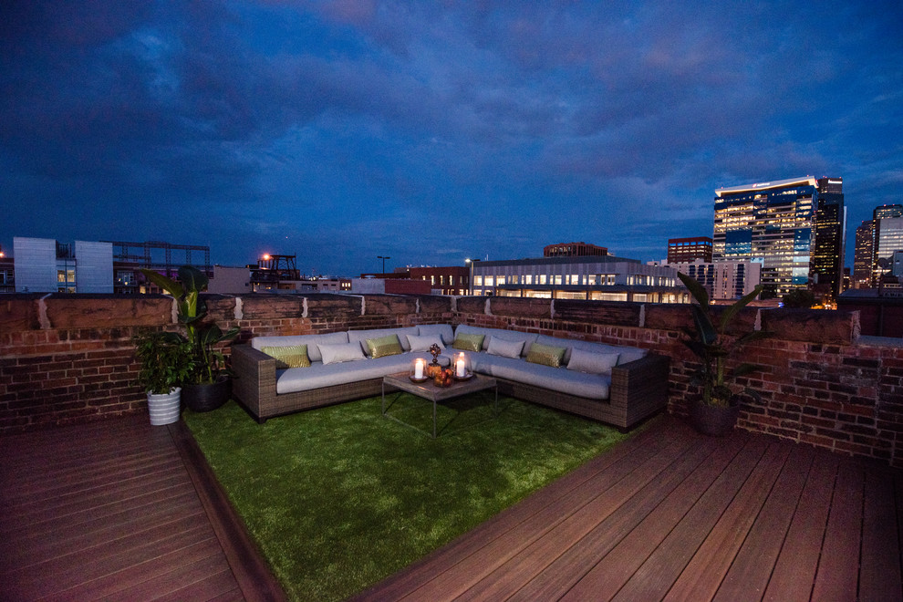 Photo of a mid-sized modern rooftop deck in Other.