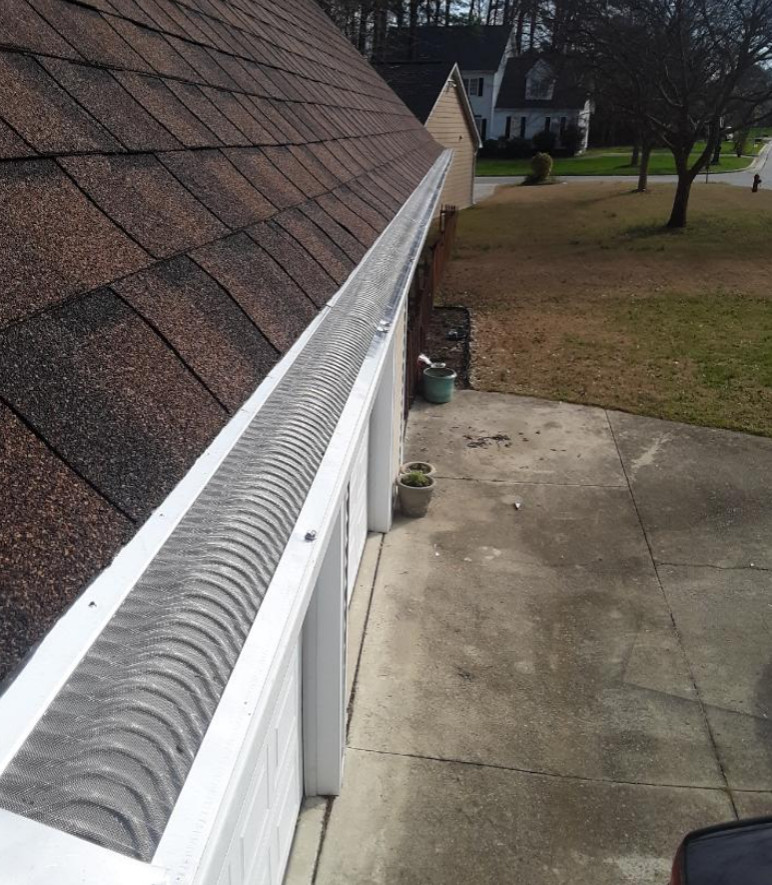 We fit our gutter guards over your existing gutters. House Exterior