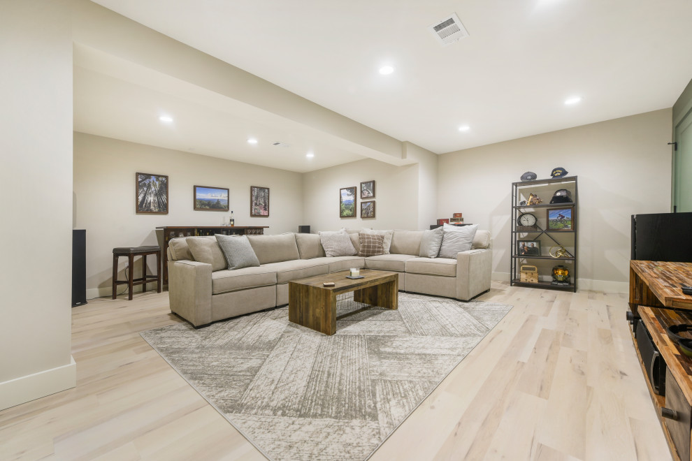 Large minimalist formal and open concept vinyl floor and beige floor living room photo in Other with white walls and a wall-mounted tv