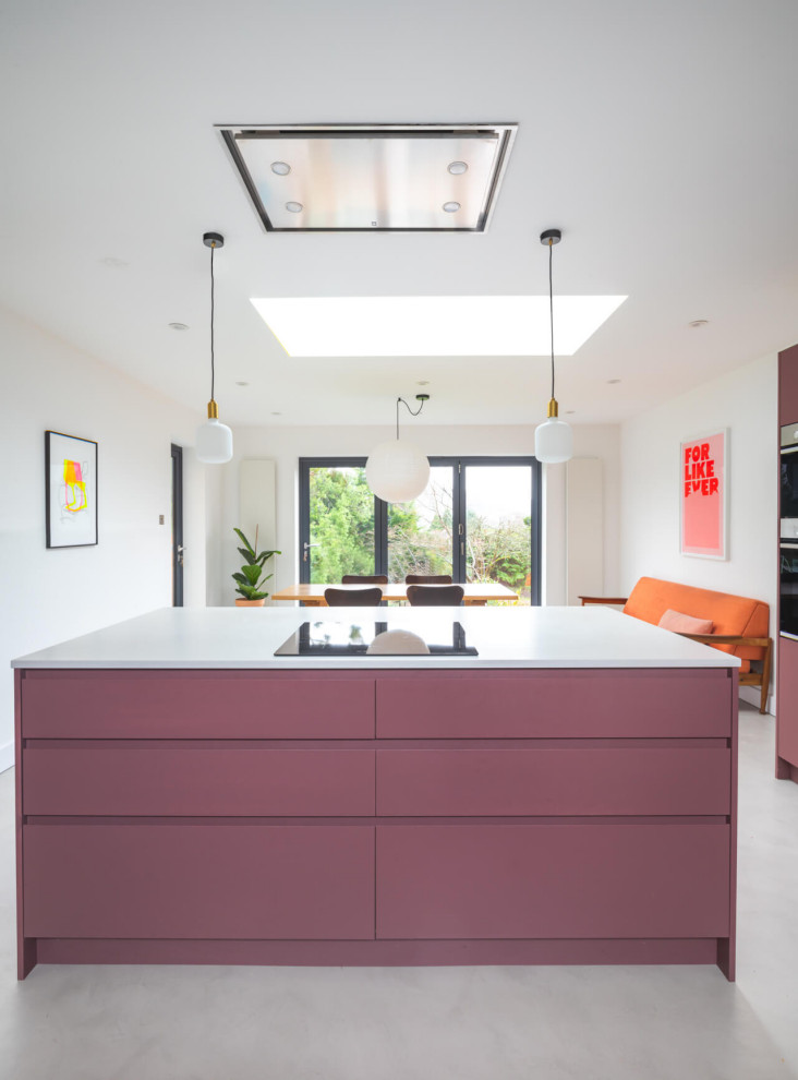 Inspiration for a mid-sized contemporary l-shaped eat-in kitchen in Other with a drop-in sink, flat-panel cabinets, purple cabinets, quartzite benchtops, white splashback, concrete floors, with island, grey floor and white benchtop.
