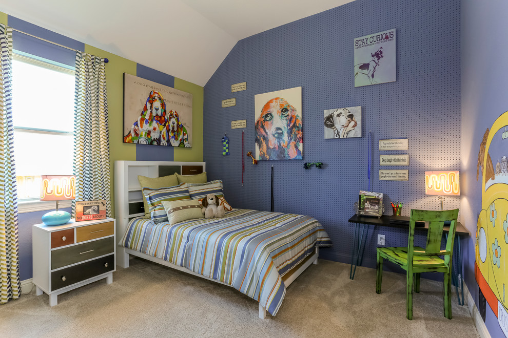 Design ideas for a mid-sized transitional gender-neutral kids' bedroom for kids 4-10 years old in Houston with carpet and blue walls.