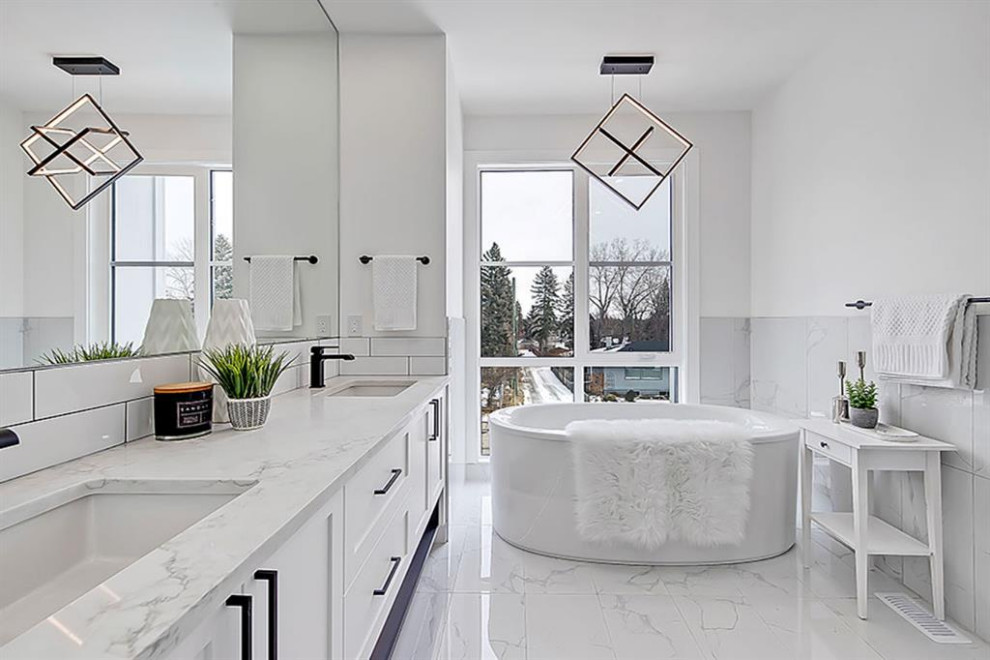 Transitional home design photo in Calgary