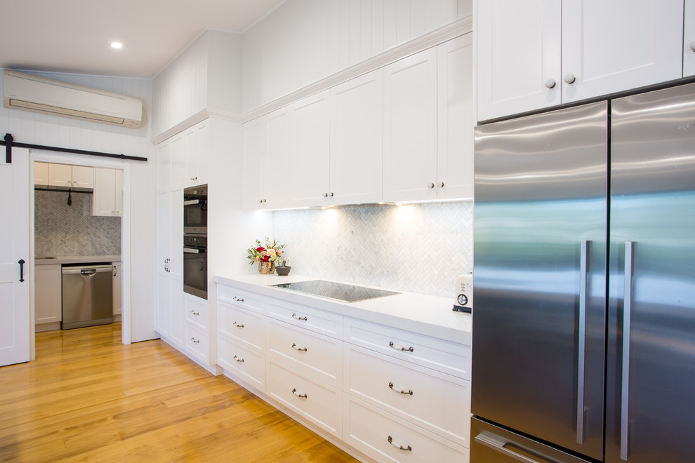 Hamptons kitchen with combined butlers pantry and laundry Contemporary Kitchen Brisbane