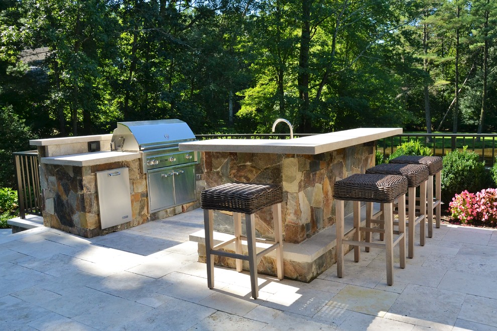 Design ideas for a small modern backyard patio in New York with an outdoor kitchen, concrete pavers and no cover.