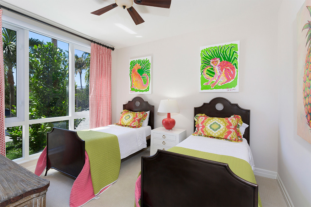 Photo of a mid-sized tropical kids' bedroom for kids 4-10 years old and girls in Miami with white walls, carpet and beige floor.