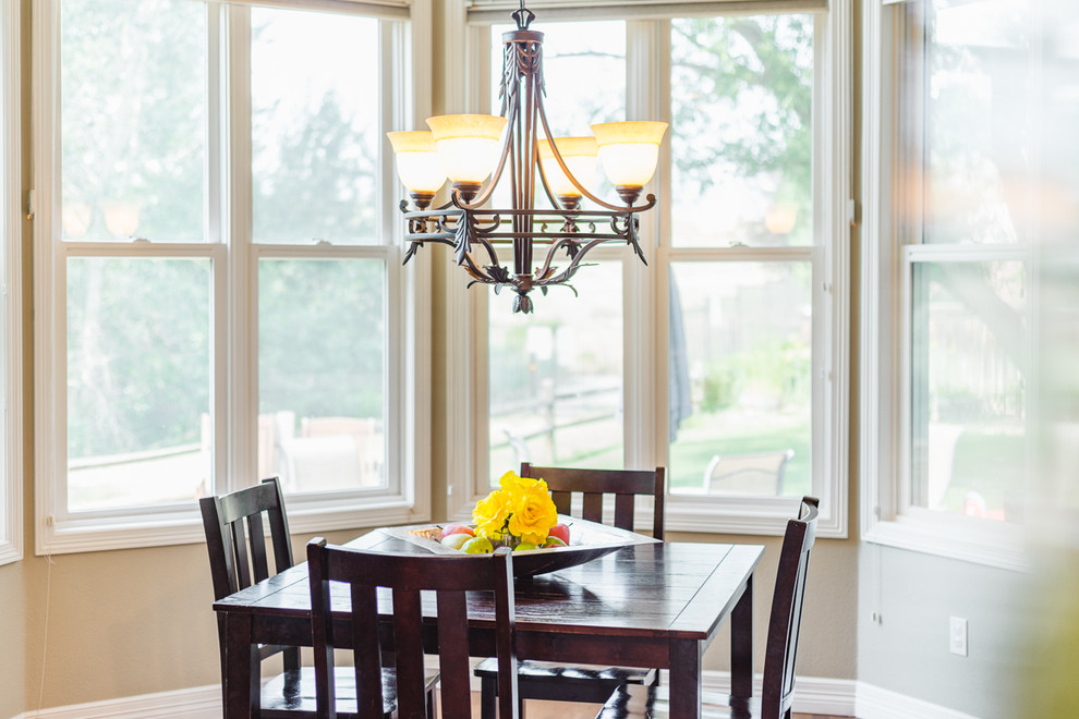 Transitional dining room photo in Denver