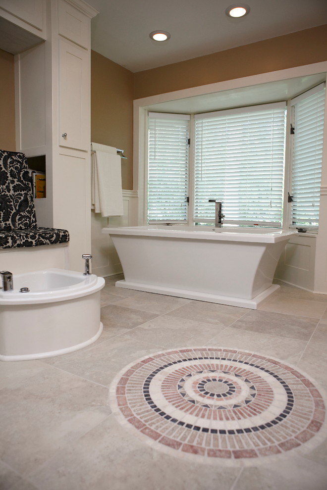 Large transitional master bathroom in Minneapolis with an undermount sink, furniture-like cabinets, black cabinets, quartzite benchtops, a freestanding tub, an open shower, a one-piece toilet, beige tile, porcelain tile, beige walls and porcelain floors.