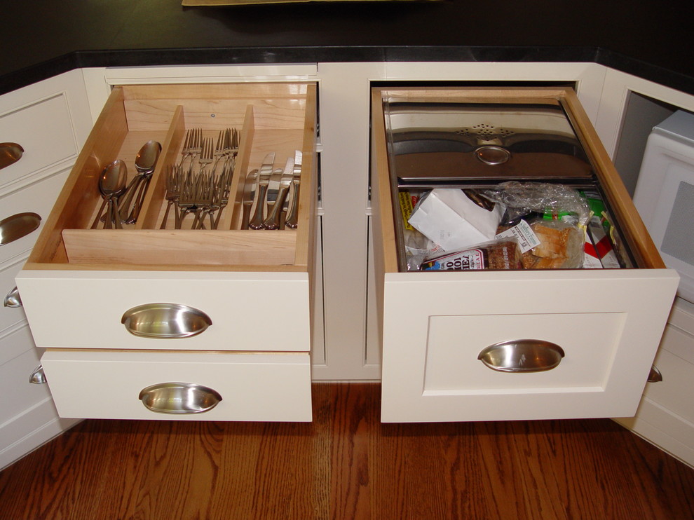 Example of a transitional medium tone wood floor eat-in kitchen design in Boston with an undermount sink, beaded inset cabinets, white cabinets, granite countertops, white backsplash, subway tile backsplash, paneled appliances, yellow walls and an island