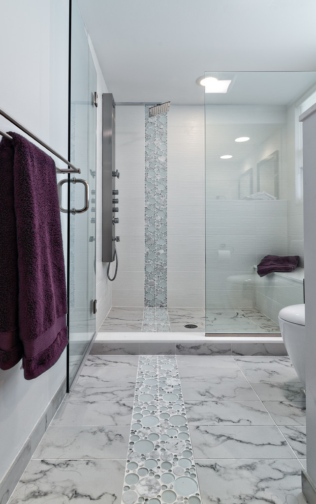 Mid-sized contemporary master bathroom in Miami with an integrated sink, flat-panel cabinets, dark wood cabinets, an open shower, a one-piece toilet, gray tile, porcelain tile, grey walls and porcelain floors.