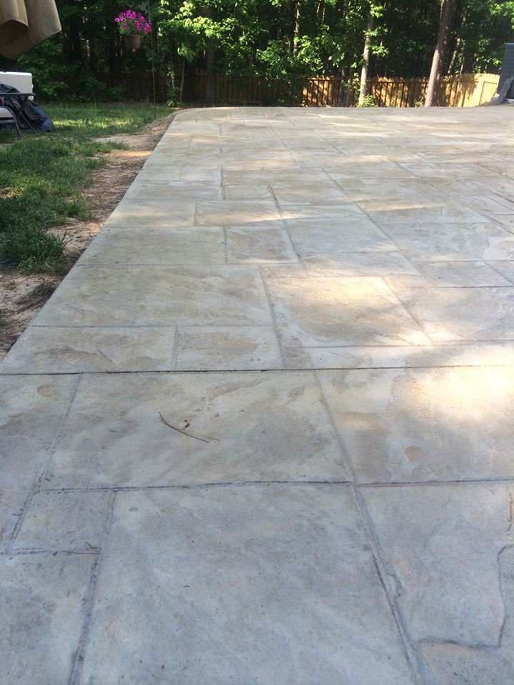 Grey Stamped Concrete Contemporary Patio Raleigh by K & E