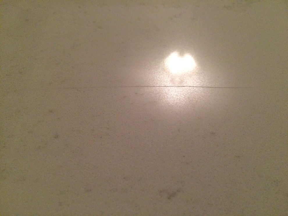 HELP! Contractor installed scratched Quartz counter