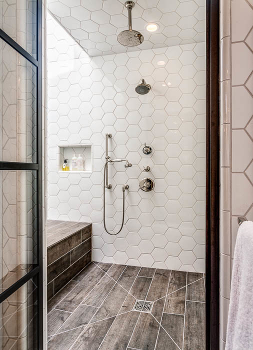Photo of a large eclectic bathroom in Los Angeles with an alcove shower, white tile, ceramic tile and ceramic floors.