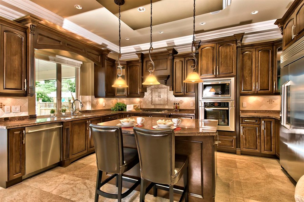 Design ideas for a traditional kitchen in Other with granite benchtops and stainless steel appliances.