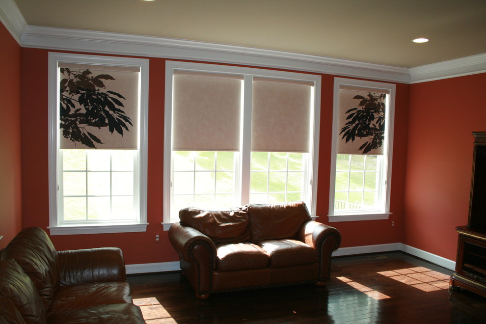 Mid-sized transitional medium tone wood floor living room photo in DC Metro with gray walls