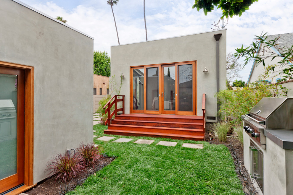 This is an example of a transitional concrete exterior in Los Angeles.