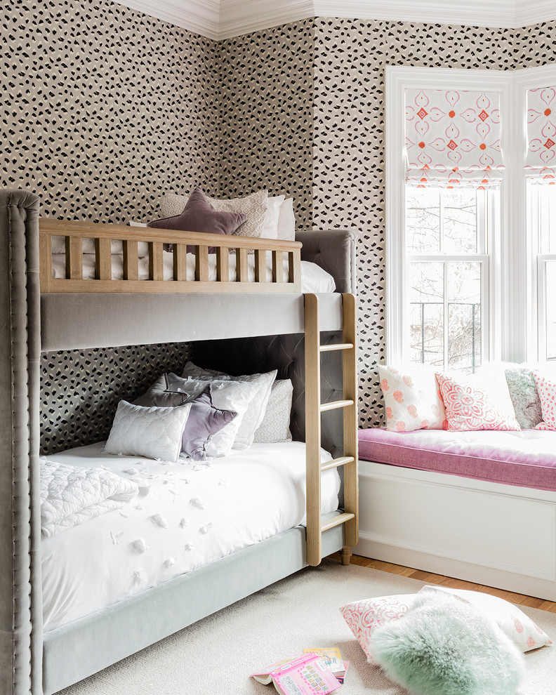 Inspiration for a transitional kids' room for kids 4-10 years old and girls in Boston with multi-coloured walls and medium hardwood floors.