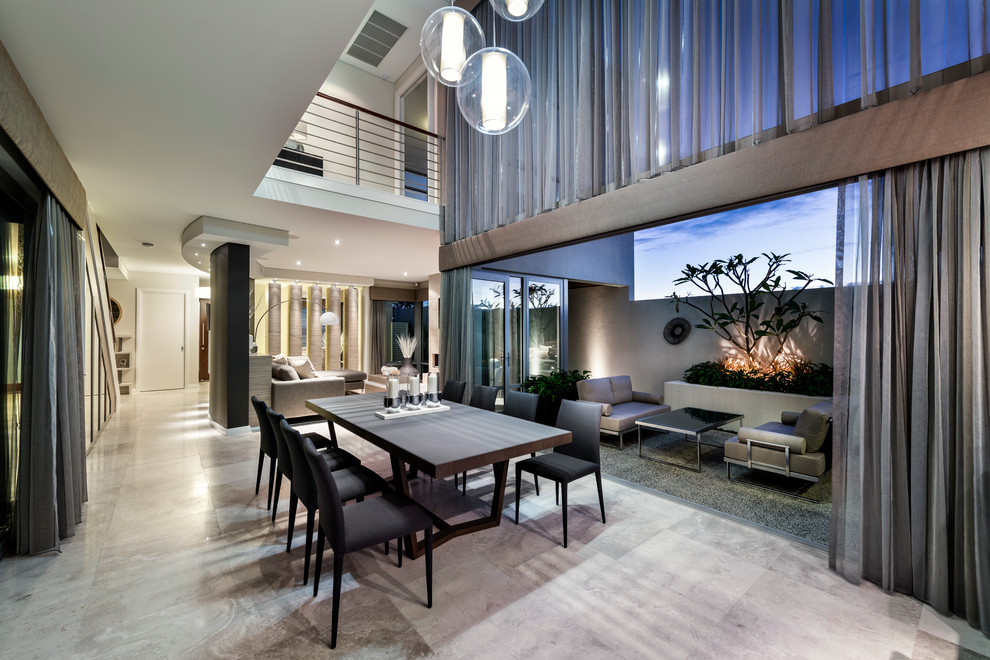 Photo of a large contemporary open plan dining in Perth with white walls.