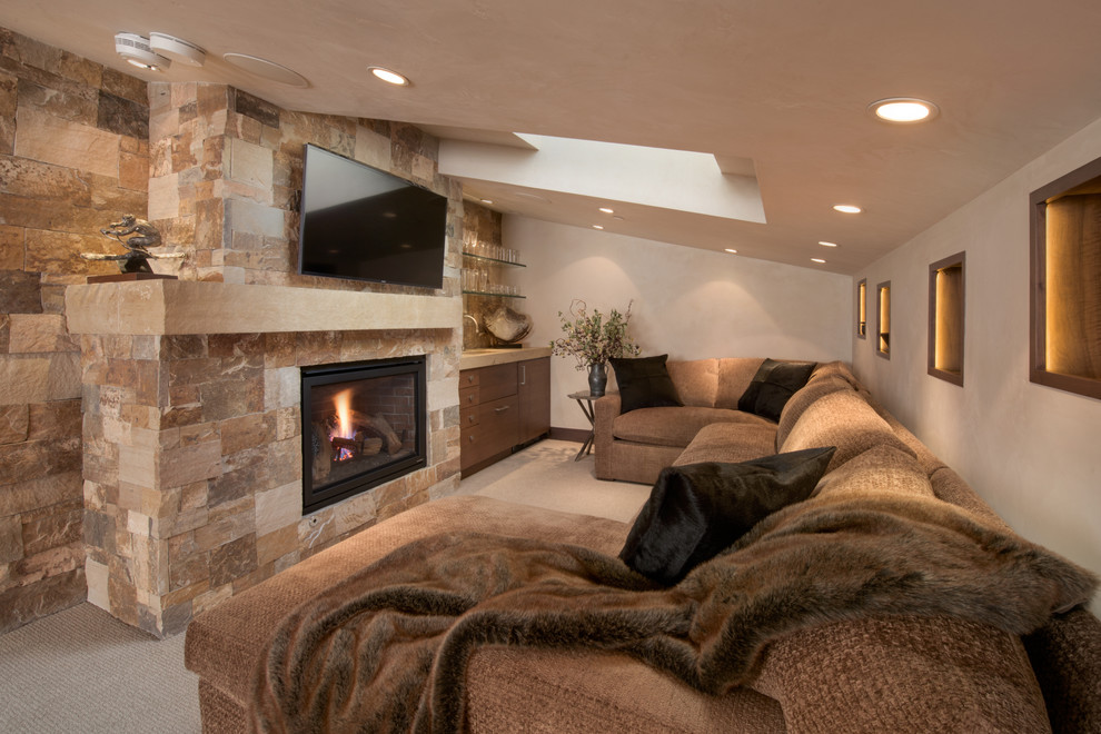 Small modern loft-style family room in Denver with white walls, carpet, a standard fireplace, a stone fireplace surround and a wall-mounted tv.