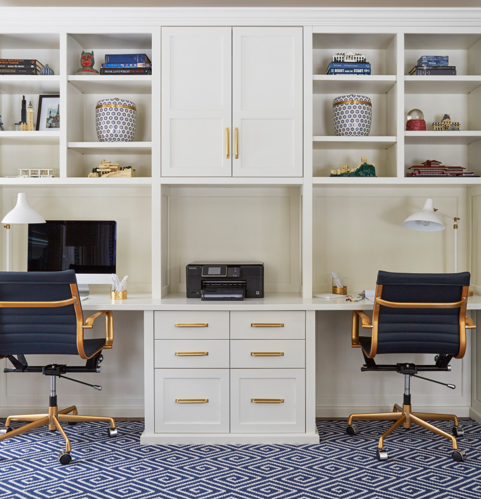 This is an example of a transitional home office in Chicago with white walls, carpet, a built-in desk and blue floor.