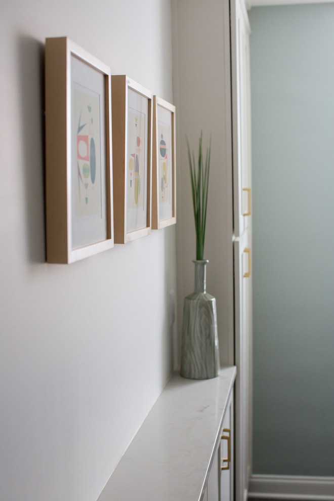 Inspiration for a small transitional galley home design remodel in DC Metro with shaker cabinets, white cabinets, glass tile backsplash and stainless steel appliances