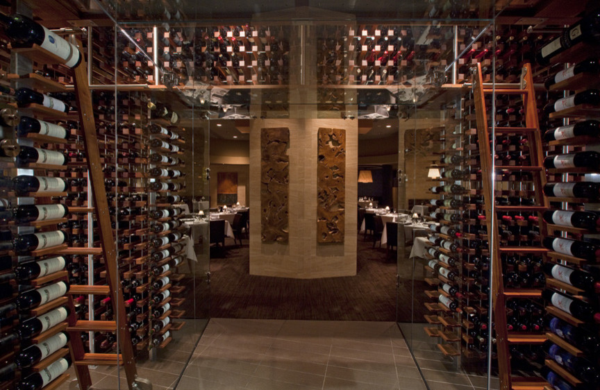 Photo of a contemporary wine cellar in Phoenix.