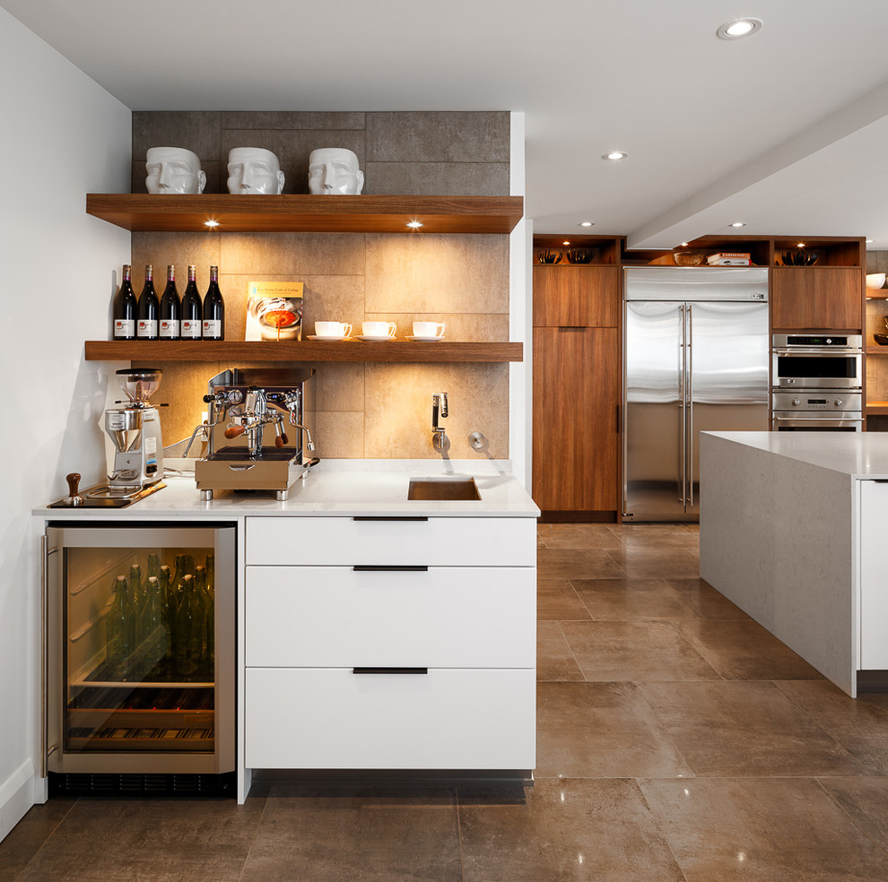 Photo of a contemporary eat-in kitchen in Ottawa with an undermount sink, flat-panel cabinets, white cabinets, quartz benchtops, subway tile splashback and stainless steel appliances.